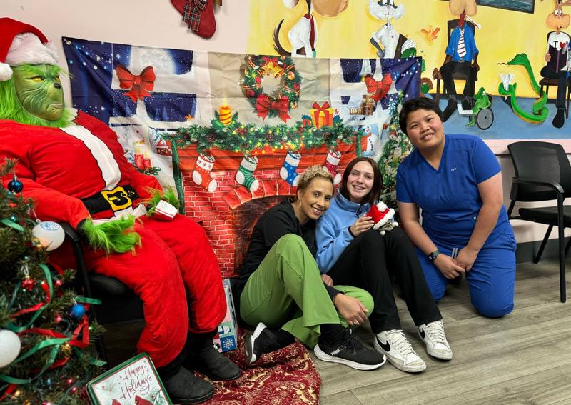 Carousel Slide 12: Jen, Ty and Syna hangin with the Grinch!